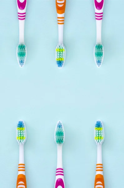 Lot Toothbrushes Lie Pastel Blue Background Top View Flat Lay — Stock Photo, Image