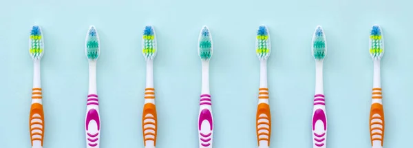 Lot Toothbrushes Lie Pastel Blue Background Top View Flat Lay — Stock Photo, Image