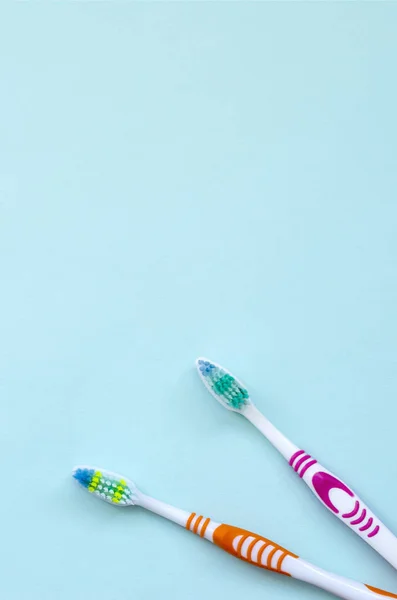 Two Toothbrushes Lie Pastel Blue Background Top View Flat Lay — Stock Photo, Image