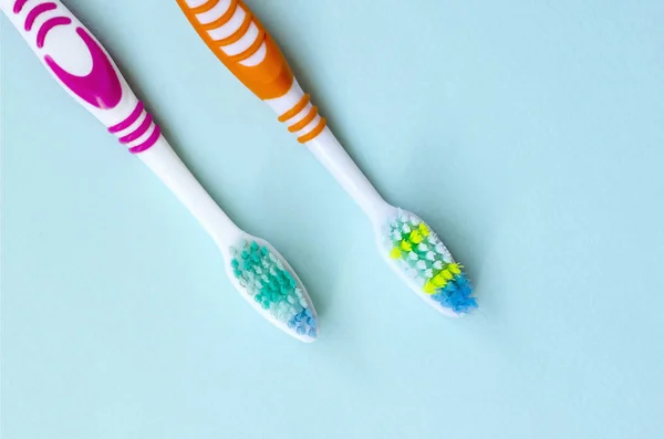 Two Toothbrushes Lie Pastel Blue Background Top View Flat Lay — Stock Photo, Image