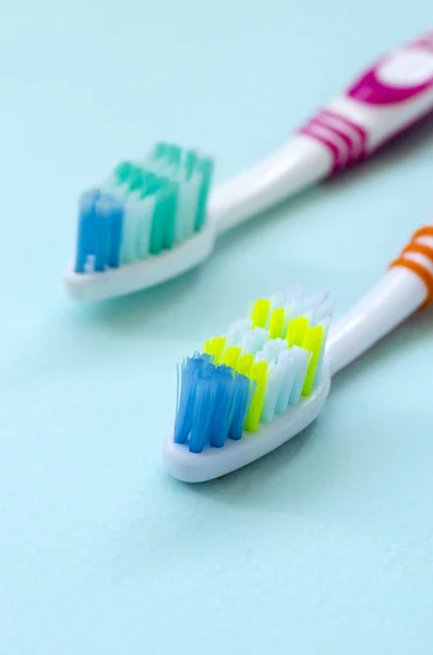 Two Toothbrushes Lie Pastel Blue Background Top View Flat Lay Royalty Free Stock Photos