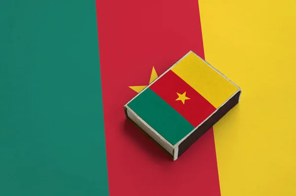 Cameroon Flag Pictured Matchbox Lies Large Flag — Stock Photo, Image