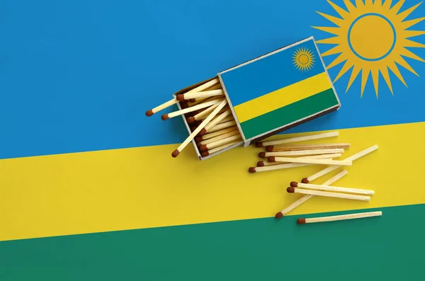 Rwanda Flag Shown Open Matchbox Which Several Matches Fall Lies — Stock Photo, Image