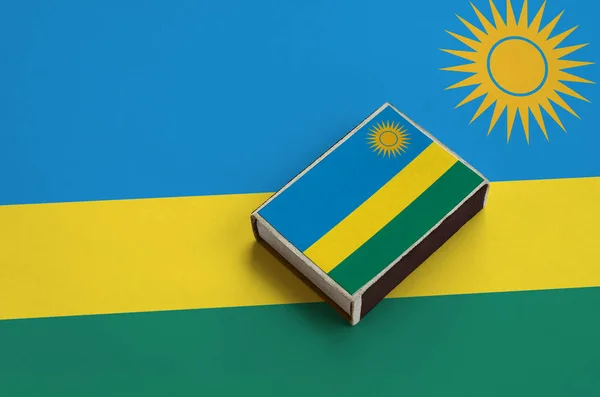 Rwanda Flag Pictured Matchbox Lies Large Flag — Stock Photo, Image
