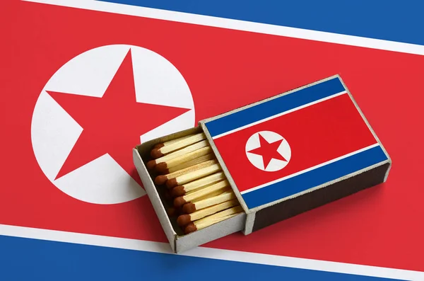 Bandera Corea Del Norte Muestra Una Caja Fósforos Abierta Que —  Fotos de Stock