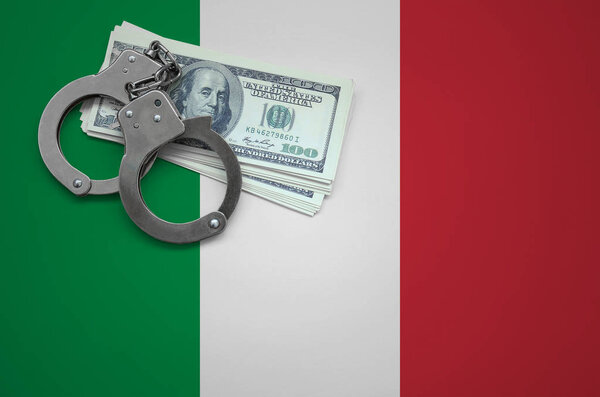 Italy flag  with handcuffs and a bundle of dollars. The concept of breaking the law and thieves crimes.