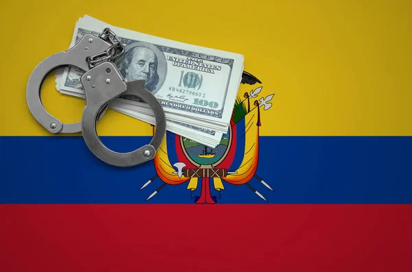 Ecuador flag  with handcuffs and a bundle of dollars. The concept of breaking the law and thieves crimes.