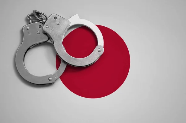 Флаг Японии Полицейские Наручники Концепция Преступности Правонарушений Стране — стоковое фото