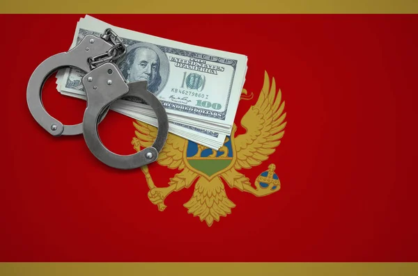 Montenegro flag  with handcuffs and a bundle of dollars. The concept of breaking the law and thieves crimes.