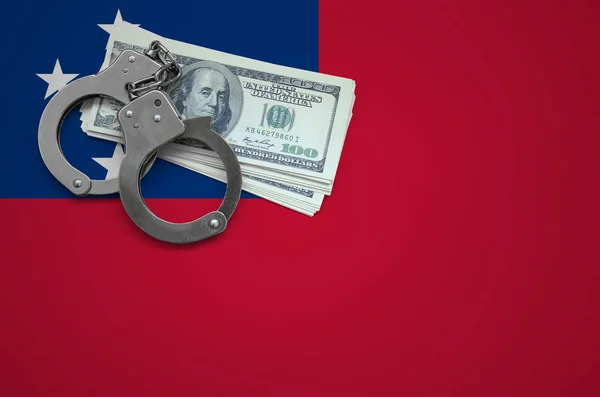Samoa flag  with handcuffs and a bundle of dollars. The concept of breaking the law and thieves crimes.