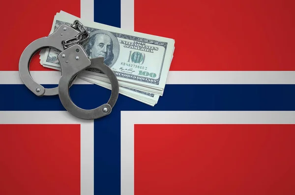 Norway flag  with handcuffs and a bundle of dollars. The concept of breaking the law and thieves crimes.