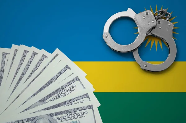Σημαία Της Ρουάντα Χειροπέδες Και Μια Δέσμη Των Δολαρίων Έννοια — Φωτογραφία Αρχείου
