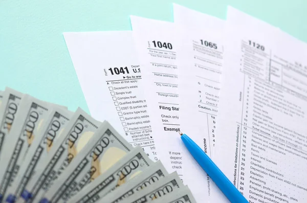 Tax Forms Lies Hundred Dollar Bills Blue Pen Light Blue — Stock Photo, Image