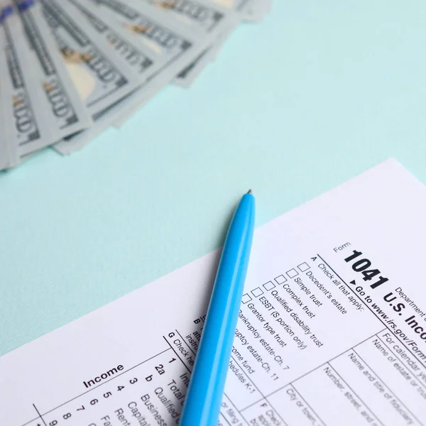 1041 Tax Form Lies Hundred Dollar Bills Blue Pen Light — Stock Photo, Image