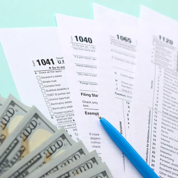 Tax Forms Lies Hundred Dollar Bills Blue Pen Light Blue — Stock Photo, Image