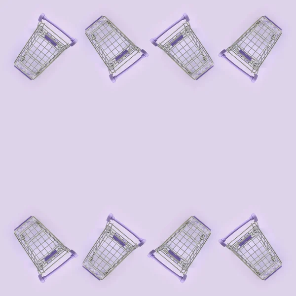 Pattern Many Small Shopping Carts Violet Background Minimalism Flat Lay — Stock Photo, Image