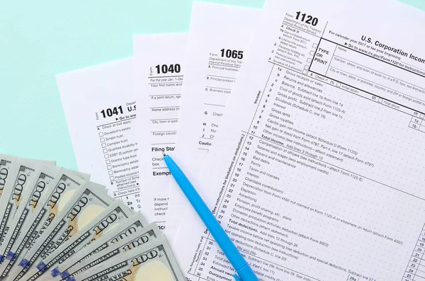 Tax Forms Lies Hundred Dollar Bills Blue Pen Light Blue — Stock Photo, Image