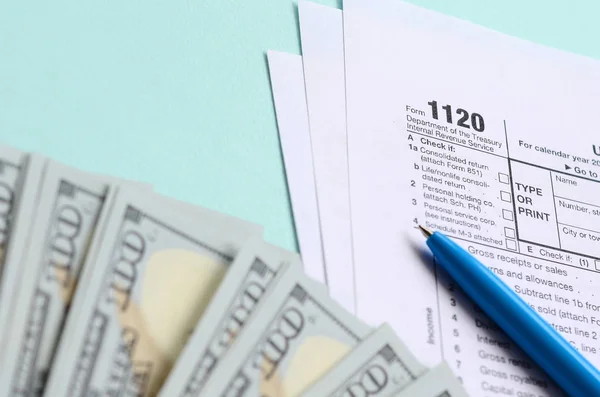 1120 Tax Form Lies Hundred Dollar Bills Blue Pen Light — Stock Photo, Image