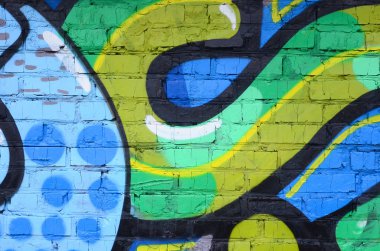 Grafiti çizimler parçası. Eski duvar boya lekeleri sokak sanatı kültür tarzı ile dekore edilmiştir. Renkli arka plan doku.
