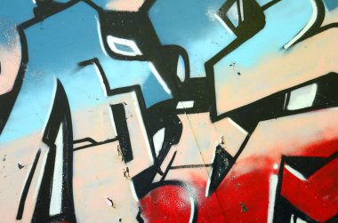 Grafiti çizimler parçası. Eski duvar boya lekeleri sokak sanatı kültür tarzı ile dekore edilmiştir. Renkli arka plan doku.