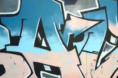 Grafiti çizimler parçası. Eski duvar boya lekeleri sokak sanatı kültür tarzı ile dekore edilmiştir. Renkli arka plan doku.