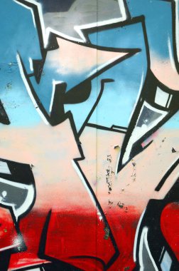 Grafiti çizimler parçası. Eski duvar boya lekeleri sokak sanatı kültür tarzı ile dekore edilmiştir. Renkli arka plan doku.
