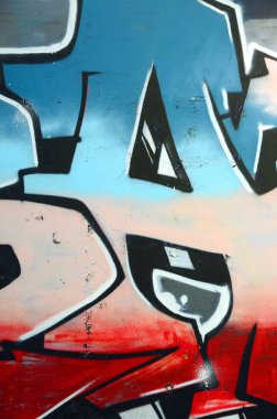 Grafiti çizimler parçası. Eski duvar boya lekeleri sokak sanatı kültür tarzı ile dekore edilmiştir. Renkli arka plan doku.