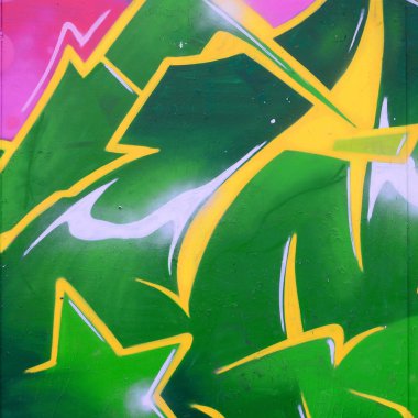 Grafiti çizimler parçası. Eski duvar boya lekeleri sokak sanatı kültür tarzı ile dekore edilmiştir. Renkli arka plan doku.