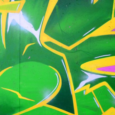 Grafiti çizimler parçası. Eski duvar boya lekeleri sokak sanatı kültür tarzı ile dekore edilmiştir. Renkli arka plan doku.