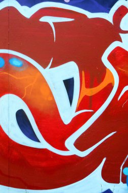 Grafiti çizimler parçası. Eski duvar boya lekeleri sokak sanatı kültür tarzı ile dekore edilmiştir. Renkli arka plan doku.