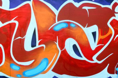 Grafiti çizimler parçası. Eski duvar boya lekeleri sokak sanatı kültür tarzı ile dekore edilmiştir. Renkli arka plan doku.