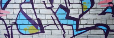Grafiti çizimler parçası. Eski duvar boya lekeleri sokak sanatı kültür tarzı ile dekore edilmiştir. Renkli arka plan doku.