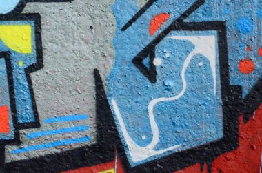 Grafiti çizimler parçası. Eski duvar boya lekeleri sokak sanatı kültür tarzı ile dekore edilmiştir. Renkli arka plan doku.
