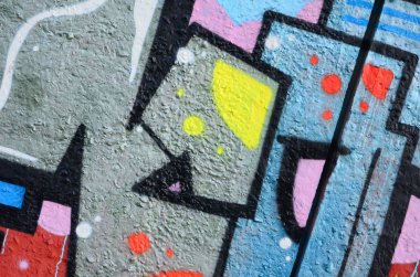 Grafiti çizimler parçası. Eski duvar boya lekeleri sokak sanatı kültür tarzı ile dekore edilmiştir. Renkli arka plan doku.