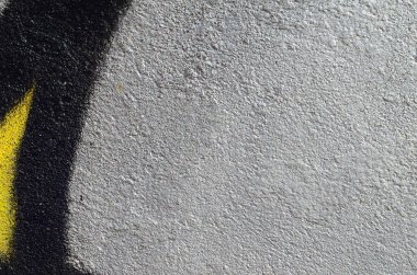 Grafiti çizimler parçası. Eski duvar boya lekeleri sokak sanatı kültür tarzı ile dekore edilmiştir. Renkli arka plan doku.