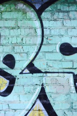 Grafiti çizimler parçası. Eski duvar boya lekeleri sokak sanatı kültür tarzı ile dekore edilmiştir. Renkli arka plan doku.