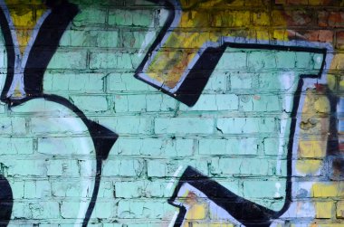Grafiti çizimler parçası. Eski duvar boya lekeleri sokak sanatı kültür tarzı ile dekore edilmiştir. Renkli arka plan doku.