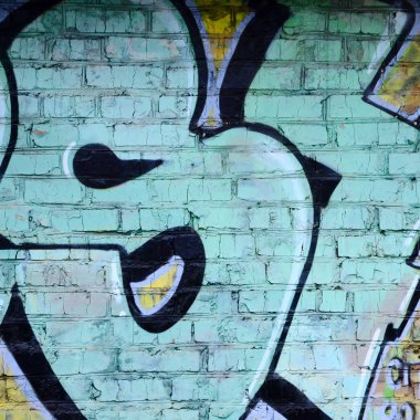Grafiti çizimler parçası. Eski duvar boya lekeleri sokak sanatı kültür tarzı ile dekore edilmiştir. Renkli arka plan doku.