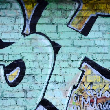 Grafiti çizimler parçası. Eski duvar boya lekeleri sokak sanatı kültür tarzı ile dekore edilmiştir. Renkli arka plan doku.