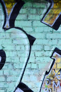 Grafiti çizimler parçası. Eski duvar boya lekeleri sokak sanatı kültür tarzı ile dekore edilmiştir. Renkli arka plan doku.