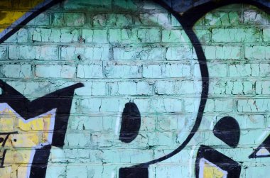Grafiti çizimler parçası. Eski duvar boya lekeleri sokak sanatı kültür tarzı ile dekore edilmiştir. Renkli arka plan doku.