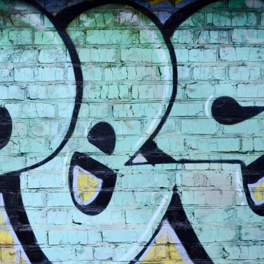 Grafiti çizimler parçası. Eski duvar boya lekeleri sokak sanatı kültür tarzı ile dekore edilmiştir. Renkli arka plan doku.