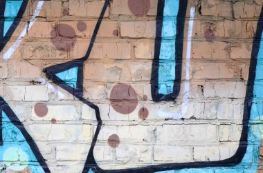 Grafiti çizimler parçası. Eski duvar boya lekeleri sokak sanatı kültür tarzı ile dekore edilmiştir. Renkli arka plan doku.
