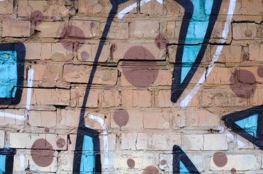 Grafiti çizimler parçası. Eski duvar boya lekeleri sokak sanatı kültür tarzı ile dekore edilmiştir. Renkli arka plan doku.
