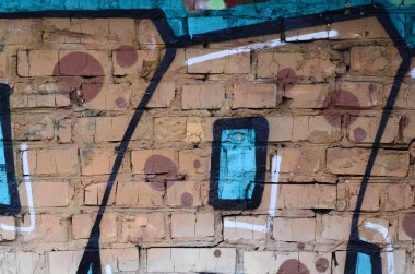 Grafiti çizimler parçası. Eski duvar boya lekeleri sokak sanatı kültür tarzı ile dekore edilmiştir. Renkli arka plan doku.