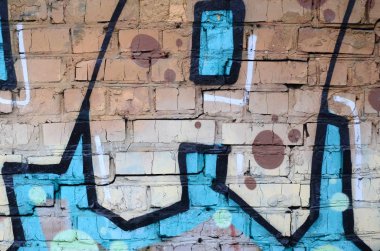 Grafiti çizimler parçası. Eski duvar boya lekeleri sokak sanatı kültür tarzı ile dekore edilmiştir. Renkli arka plan doku.