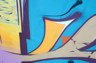 Grafiti çizimler parçası. Eski duvar boya lekeleri sokak sanatı kültür tarzı ile dekore edilmiştir. Renkli arka plan doku.