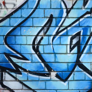 Grafiti çizimler parçası. Eski duvar boya lekeleri sokak sanatı kültür tarzı ile dekore edilmiştir. Renkli arka plan doku.