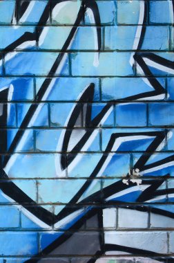 Grafiti çizimler parçası. Eski duvar boya lekeleri sokak sanatı kültür tarzı ile dekore edilmiştir. Renkli arka plan doku.