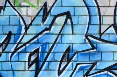 Grafiti çizimler parçası. Eski duvar boya lekeleri sokak sanatı kültür tarzı ile dekore edilmiştir. Renkli arka plan doku.
